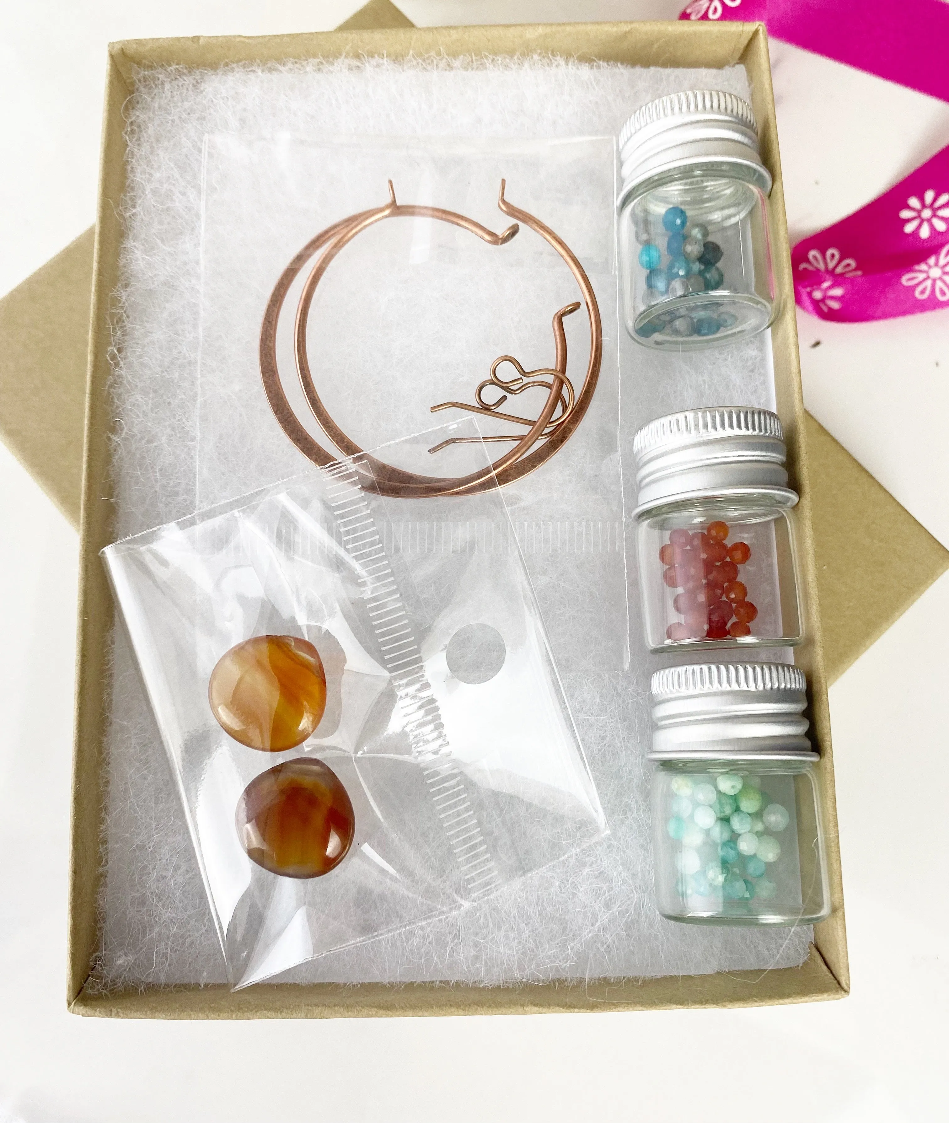Bead kit. Copper earrings, wire wrapped hoops, mixed stone and carnelian agate drops. Belle Magazine 2022.